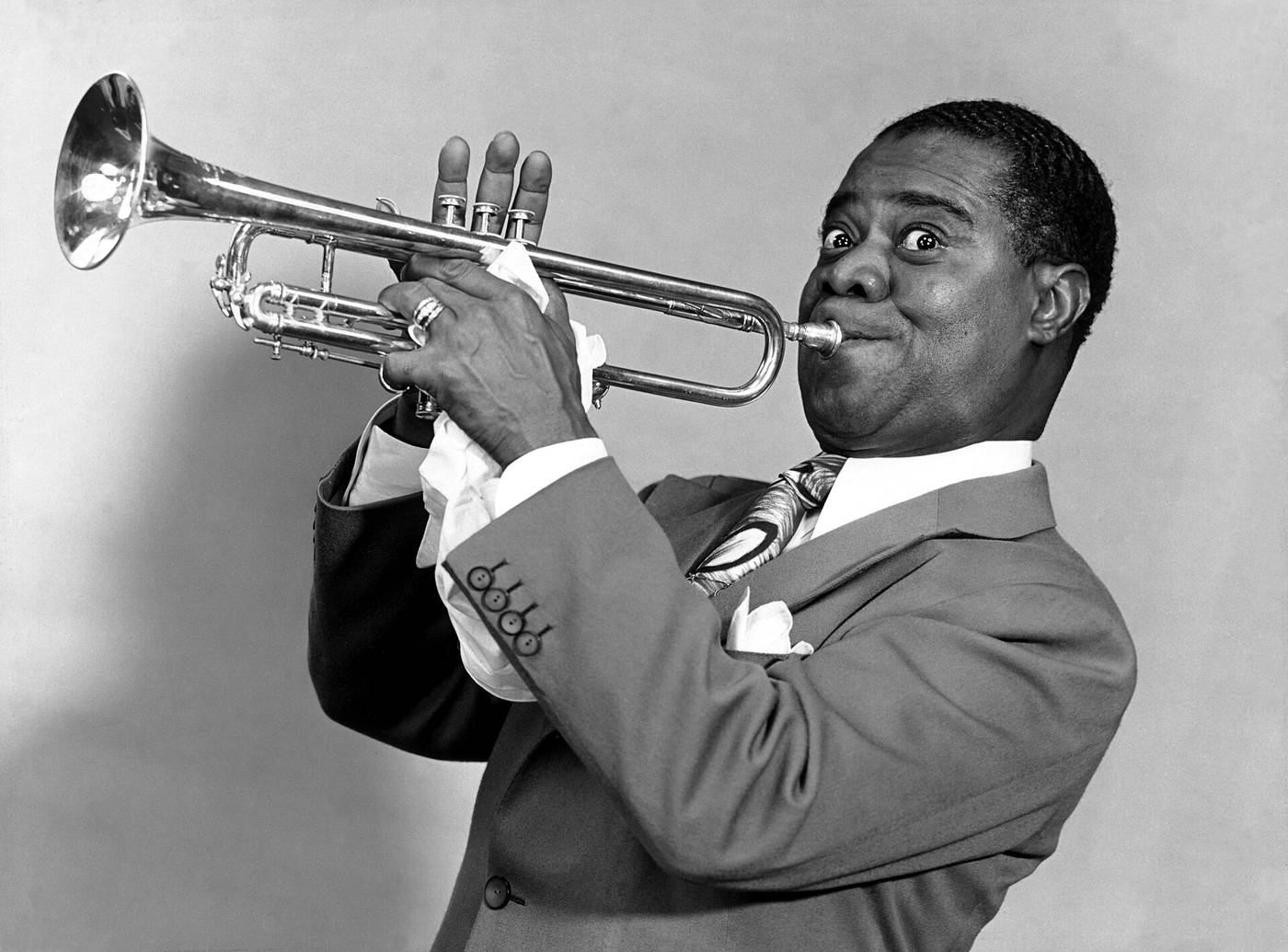 Louis Armstrong playing trumpet, 1947
