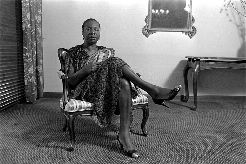 Nina Simone seated in her home, 1985